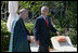 President George W. Bush walks with Afghanistan President Hamid Karzai Saturday, May 17, 2008, as they arrive to speak with members of the media following their meeting in Sharm el-Shiek, Egypt.