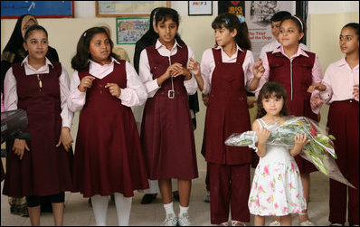 Students at Farouz Experimental School for Languages at Sharm El Sheikh await the arrival of Mrs. Laura Bush after per participation Sunday, May 18, 2008, at a Big Read Egypt/U.S. roundtable. Mrs. Bush was greeted with song and presented flowers before her departure.
