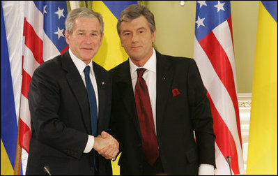President George W. Bush and President Viktor Yushchenko of the Ukraine shake hands after their joint press availability Tuesday, April 1, 2008, at the Presidential Secretariat in Kyiv. President and Mrs. Laura Bush attended daylong events in the Ukraine capital before departing for Romania, site of the 2008 NATO Summit.