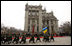 An honor guard marches past the red carpet in front of the Presidential Secretariat in Kyiv Tuesday, April 1, 2008, during arrival ceremonies for President George W. Bush and Mrs. Laura Bush.
