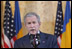 President George W. Bush delivers a keynote speech Tuesday, April 2, 2008, at the National Bank of Savings in Bucharest, site of the two-day NATO Summit. The President urged the NATO membership to be open to any European democracy that sought it.
