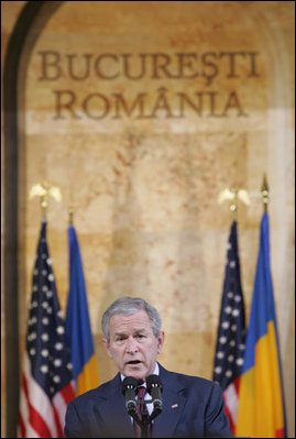 President George W. Bush delivers a keynote speech Tuesday, April 2, 2008, at the National Bank of Savings in Bucharest, site of the two-day NATO Summit. The President urged the NATO membership to be open to any European democracy that sought it.
