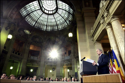 President George W. Bush delivers remarks Tuesday, April 2, 2008, at the National Bank of Savings in Bucharest, his first day in Romania, site of the 2008 NATO Summit.