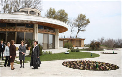 Mrs. Laura Bush joins Mrs. Maria Basescu, in dark dress, spouse of Romanian President Traian Basescu, at Protocol Villas Neptun-Olimp, the presidential retreat, in Neptun, Romania, Wednesday, April 2, 2008.