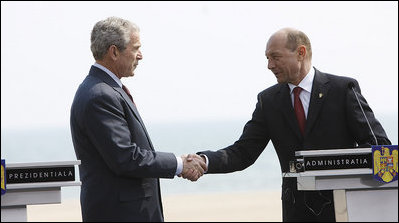 President George W. Bush and President Taian Basescu of Romania, shake hands after concluding their joint press availability Wednesday, April 2, 2008, at the presidential retreat in Neptun, Romania.