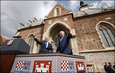President George W. Bush and Prime Minister Ivo Sanader of Croatia, wave to the thousands who flocked to St. Mark's Square in downtown Zagreb Saturday, April 5, 2008, to see and hear the U.S. President.