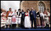 President George W. Bush and Prime Minister Ivo Sanader appear on stage with dancers in tradition Croatian garb Saturday, April 5, 2008, in Zagreb's St. Mark's Square. The President and Mrs. Bush made the overnight stop in the Croatian capitol before departing for Russia.