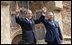 President George W. Bush and Prime Minister Ivo Sanader of Croatia, raise hands together before thousands who flocked to St. Mark's Square in downtown Zagreb Saturday, April 5, 2008, to see and hear the U.S. President.