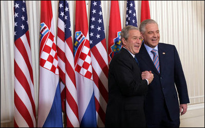 President George W. Bush and Prime Minister Ivo Sanader of Croatia, smile for cameras at Banski Dvori in Zagreb Saturday, April 5, 2008. The President and Mrs. Bush spent the morning in the Croatia capital before continuing on to Sochi, Russia, on the last leg of their Eastern European visit.