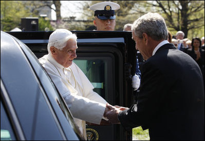 President George W. Bush shakes hands with Pope Benedict XVI on his arrival to the White House Wednesday, April 16, 2008, for the welcoming ceremony on the South Lawn in honor of the Pope's visit to the United States.