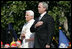 President George W. Bush and Pope Benedict XVI stand together during the playing of the National Anthem at the Pope's welcoming ceremony on the South Lawn of the White House Wednesday, April 16, 2008.