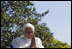 Pope Benedict XVI acknowledges guests Wednesday, April 16, 2008, during the arrival ceremony for the Pope on the South Lawn of the White House. Said Pope Benedict XVI during the ceremony, "Mr. President, dear friends, as I begin my visit to the United States, I express once more my gratitude for your invitation, my joy to be in your midst, and my fervent prayers that Almighty God will confirm this nation and its people in the ways of justice, prosperity and peace."