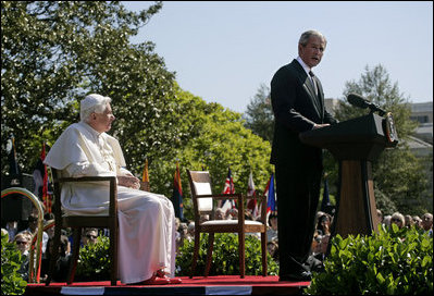 President George W. Bush delivers remarks Wednesday, April 16, 2008, during the arrival ceremony for Pope Benedict XVI on the South Lawn of the White House. Said the President, "Holy Father, thank you for making this journey to America. Our nation welcomes you. We appreciate the example you set for the world, and we ask that you always keep us in your prayers."