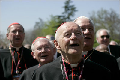 Members of the clergy sing "Happy Birthday" to Pope Benedict XVI in celebration of the Pope's 81st birthday, Wednesday, April 16, 2008, during an arrival ceremony for the Holy Father on the South Lawn of the White House.