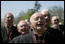 Members of the clergy sing "Happy Birthday" to Pope Benedict XVI in celebration of the Pope's 81st birthday, Wednesday, April 16, 2008, during an arrival ceremony for the Holy Father on the South Lawn of the White House.