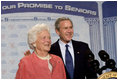 Former First Lady Barbara Bush introduces her son President George W. Bush during a discussion on strengthening Social Security at the Lake Nona YMCA Family Center in Orlando, Fla., Friday, Mar. 18, 2005.
