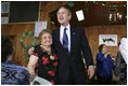 President George W. Bush visits with retirees at The Life Project Senior Development Center in Orlando, Fla., Friday March 18, 2005.
