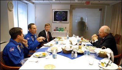 Vice President Dick Cheney meets with astronauts Dan Bursch, left, Carl Walz, center, Frank Culbertson and NASA Administrator Sean O'Keefe, who is not pictured, at NASA Headquarters in Washington, D.C., Wednesday, Nov. 20. Mr. Bursch and Mr. Walz hold the U.S. space endurance record for spending 196 days in space.