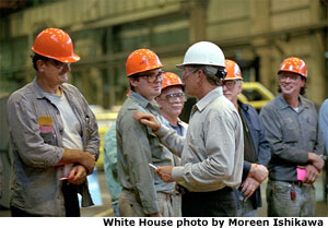 Stopping by the U.S. Steel Group Steelworkers Picnic at Mon Valley Works, President Bush visits with some of the employees still on the job Aug. 26. White House photo by Moreen Ishikawa.
