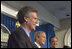President George W. Bush and outgoing Press Secretary Scott McClellan introduces the new White House Press Secretary, Tony Snow, to the press in the James S. Brady Press Briefing Room Wednesday, April 26, 2006.