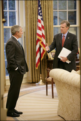 President George W. Bush meets with White House Press Secretary Tony Snow in the Oval Office Sept. 6, 2006.