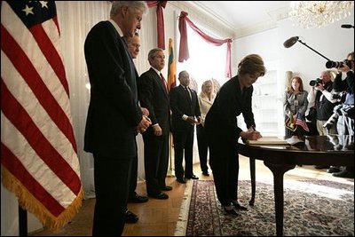 Sri Lanka. Laura Bush signs a condolence book for the victims of the recent tsunami during a visit to the Embassy of Sri Lanka in Washington, D.C., Monday, Jan. 3, 2005. Also signing to express their condolences are President George W. Bush and former Presidents Clinton and Bush.