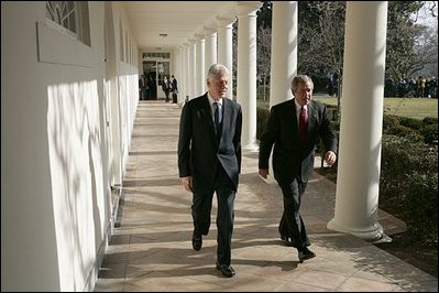 President George W. Bush walks with former President Bill Clinton along the colonnade at the White House Monday, Jan. 3, 2005. Former Presidents Clinton and George H.W. Bush are leading a nationwide charitable fundraising to aid victims of last week's earthquake and tsunamis in South Asia.