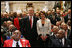 President George W. Bush and Speaker of the House Nancy Pelosi join 300 Tuskegee Airmen in Statuary Hall at the U.S. Capitol for a photograph Thursday, March 29, 2007. The group photo was part of the Congressional Gold Medal ceremony honoring America’s first African-American military airmen. White House photo by Eric Draper