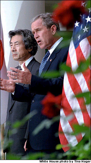 President Bush and Japanese Prime Minister Junichiro Koizumi conduct a joint press conference in the Rose Garden Sept. 25. "We Japanese are ready to stand by the United States to fight terrorism,