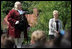 Lynne Cheney looks on as Benjamin Franklin address a group of fourth graders from local Fairfax County public schools during a Constitution Day 2005 celebration at George Washington's Mount Vernon Estate Friday, September 16, 2005. Mrs. Cheney hosted the event which celebrates the anniversary of the signing of the U.S. Constitution 218 years ago.