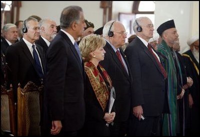 Vice President Dick Cheney and his wife, Lynne, attend the swearing-in ceremony for Afghanistan President Hamid Karzai at Salaam Khana in Kabul, Afghanistan, Dec. 7, 2004. President Karzai is Afghanistan.s first democratically-elected president in Afghanistan's history. Also pictured, from left back, Secretary of Defense Donald Rumsfeld, Afghanistan Vice President Hedayat Amin Arsala, left front; U.S. Ambassador to Afghanistan Zalmay Khalilzad, and Afghanistan President Hamid Karzai, right.