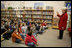 Mrs. Cheney holds up her finger as she describes to students at W.W. Burrows Elementary School in Quantico the procedure for casting votes in the upcoming parliamentary elections in Iraq and its importance. Mrs. Cheney spoke to the kids Tuesday, Dec. 13, 2005, on the U.S. Marine Corps base.
