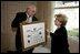 Mrs. Lynne Cheney is presented the National Society of the Sons of the American Revolution (NSSAR) Distinguished Patriot Award by Timothy R. Bennett, NSSAR Registrar General, Wednesday, July 30, 2008, at the Vice President's Residence at the Naval Observatory in Washington, D.C.