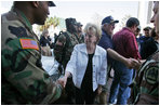 Mrs. Cheney shakes hands with police and military EMS personnel during a recent tour to the flood ravaged areas of New Orleans, Louisiana Thursday, September 8, 2005, to survey damage and relief efforts in the wake of Hurricane Katrina.