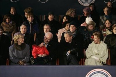 President George W. Bush and Laura Bush sit with Vice President Dick Cheney, Lynne Cheney, and their granddaughter, Grace Perry, during a concert commemorating the 55th Presidential Inauguration on the Ellipse in Washington, D.C., Wednesday, Jan. 19, 2005. White House photo by Eric Draper 