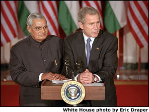 President George W. Bush participates in a press availability with Prime Minister Atal Bihari Vajpayee of India in the Cross Hall of the White House November 9, 2001. White House photo by Eric Draper.