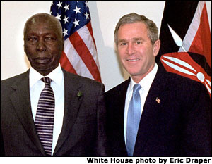 President George W. Bush poses with President Daniel T. arap Moi of Kenya at the United Nation headquarters in New York City Nov. 10. White House photo by Eric Draper.