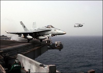 The Arabian Gulf (Mar. 20, 2003) -- An F/A-18C Hornet assigned to the “Stingers” of Strike Fighter Squadron One One Three (VFA 113) launches from the flight deck aboard the aircraft carrier USS Abraham Lincoln (CVN 72).U.S. Navy photo by Photographer's Mate 3rd Class Philip A. McDaniel 