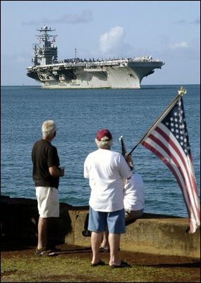 Pearl Harbor, Hawaii (Apr. 26, 2003) -- Spectators welcome the aircraft carrier, USS Abraham Lincoln (CVN 72) to Pearl Harbor. U.S. Navy photo by Photographer’s Mate 2nd Class Joshua L. Pritekel