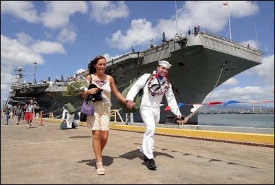 Pearl Harbor, Hawaii (Apr. 26, 2003) -- Electronics Technician 2nd Class Richard Barber and wife go out for liberty after his ship the aircraft carrier USS Abraham Lincoln (CVN 72) pulled into Pearl Harbor for a brief port visit. U.S. Navy photo by Photographer’s Mate 1st Class William R. Goodwin