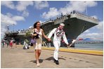 Pearl Harbor, Hawaii (Apr. 26, 2003) -- Electronics Technician 2nd Class Richard Barber and wife go out for liberty after his ship the aircraft carrier USS Abraham Lincoln (CVN 72) pulled into Pearl Harbor for a brief port visit. U.S. Navy photo by Photographer’s Mate 1st Class William R. Goodwin