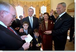 President George W. Bush and Vice President Cheney swear in Secretary of State Colin Powell in the Oval Office Jan. 26, 2001. “Today, America calls on Colin Powell again,” said the President. “He is a leader who understands that America must work closely with our friends in times of calm if we want to be able to call on them in times of crisis. He understands that our nation is at its best when we project our strength and purpose with humility. I know of no better person to be the face and voice of American diplomacy than Colin Powell. His dignity and integrity will add to the strength and authority of America around the world."  White House photo by Eric Draper
