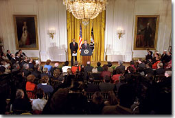 President George W. Bush and Rod Paige, who has been chosen to be the Secretary of Education, unveil the administration's education plan in the East Room Jan. 23, 2001. "Both parties have been talking about education reform for quite a while," said the President. "It's time to come together to get it done so that we can truthfully say in America, 'No child will be left behind -- not one single child.' We share a moment of exceptional promise -- a new administration, a newly sworn-in Congress, and we have a chance to think anew and act anew." White House photo by Hyungwon Kang