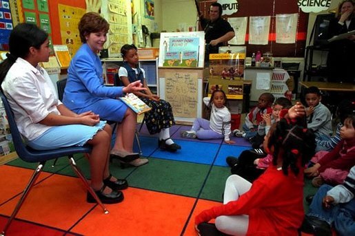Laura Bush takes questions from students after reading wit them at Caesar Chavez Elementary School in Hyattsville, Maryland, Feb., 26, 2001. White House photo by Carol T. Powers.