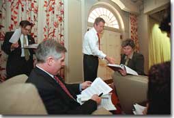President George W. Bush holds meetings with advisors to discuss the budget plan.