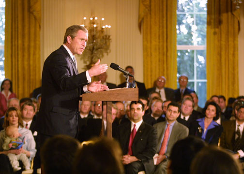 President Bush speaks to small business owners in the East Room of the White House.