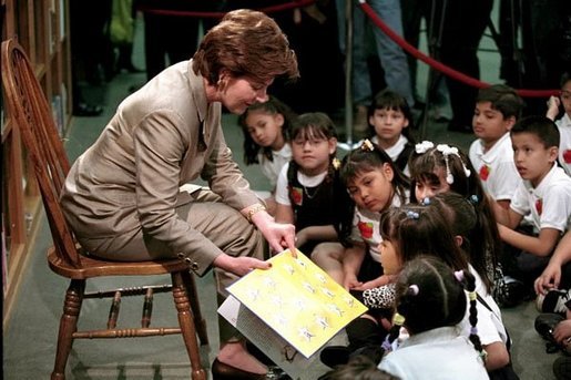 Laura Bush reads to a group of second-graders in the library of Morningside Elementary School in San Fernando, Calif., March 22, 2001. White House photo by Paul Morse.
