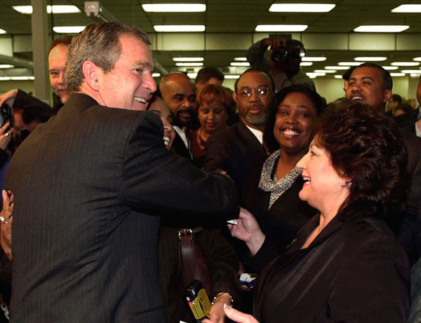 President George W. Bush greets employees and local small business owners during an event at Bajan Industries in Kansas City, Monday, March 26, 2001. WHITE HOUSE PHOTO BY ERIC DRAPER
