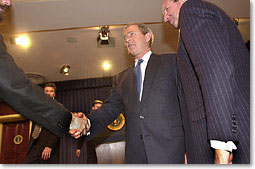 President Bush greets members of the National Restaurant Association. White House photo by Eric Draper.