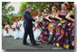 President George W. Bush greets dancers before their performance during Cinco De Mayo festivities at the White House Friday, May 4. WHITE HOUSE PHOTOS BY ERIC DRAPER